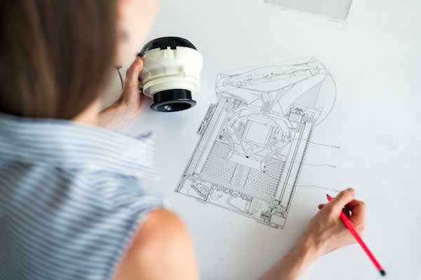 female engineer designing equipment