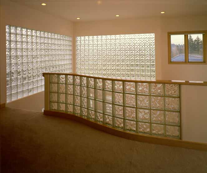 Glass blocks used as a banister for a an upper floor, half wall