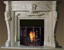 Ornate marble fireplace mantel and surround