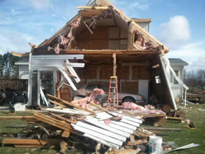house damaged by tornado