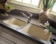Solid surface kitchen sink as an integral part of the countertop