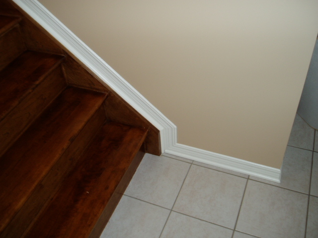 transitioning baseboard from floor to staircase