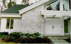 house with natural stone siding