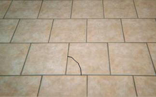 cracked ceramic flooring tile