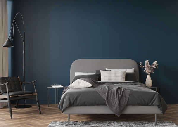 bedroom painted in blues and greys
