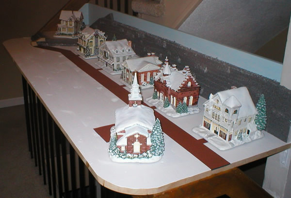 Christmas village buildings positioned from right