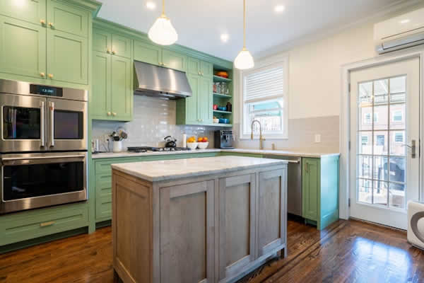 kitchen with green cabinets