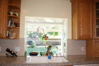 growing herbs in a kitchen window