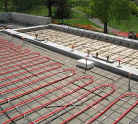 hydronic hot water system being installed on concrete slab