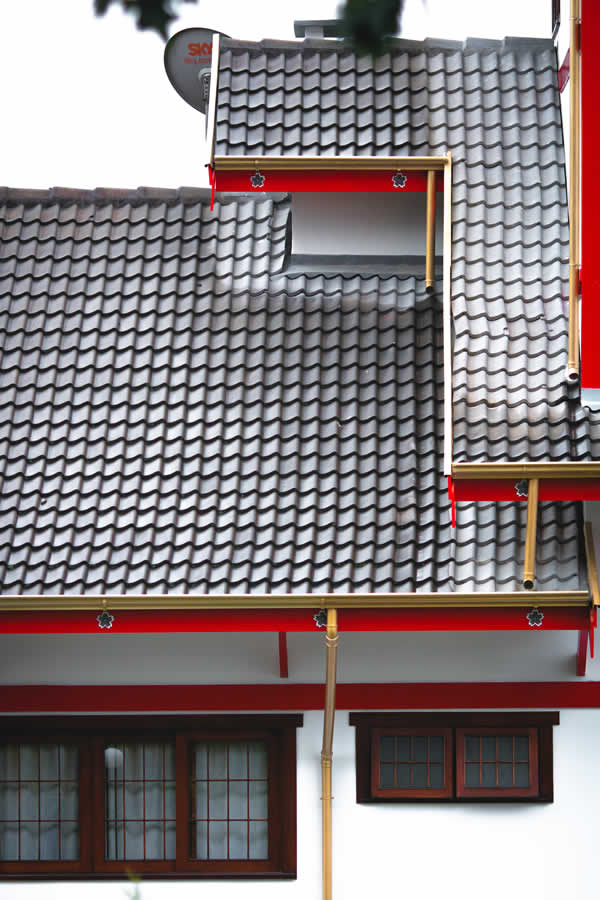 metal roof on red painted building