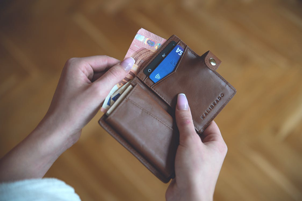 wallet with cash and credit cards