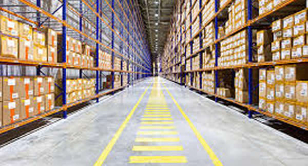 inside of a warehouse, products in boxes on shelving