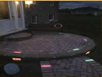walkway with colored low voltage light lenses