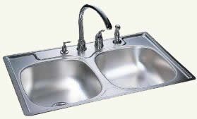 Drop-in double bowl, stainless steel kitchen sink with drill holes for faucets and accessories.