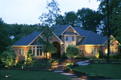Landscape lighting highlighting a home