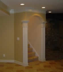 wall switch and receptacle at basement stairwell landing