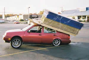 car loaded with lumber