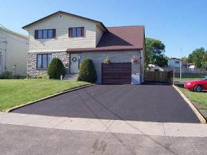 Driveway paved with asphalt