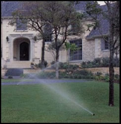 underground sprinkler system in front of home