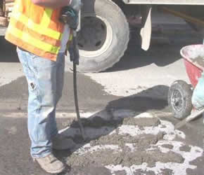 vibrating a concrete slab to remove air pockets